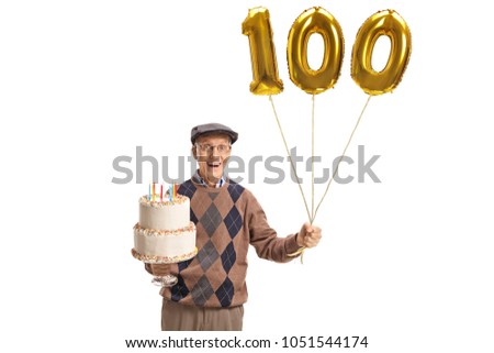Happy senior with a birthday cake and a number hundred balloon isolated on white background