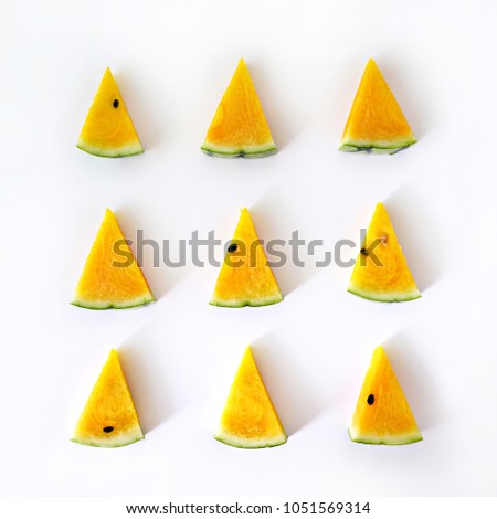 Creative layout of yellow watermelon on white background. Flat lay. Food concept. 