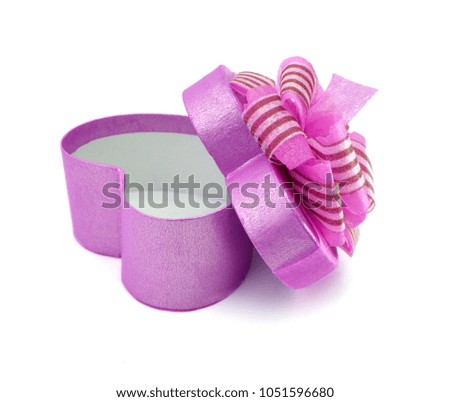 Pink gift with bow isolated on white