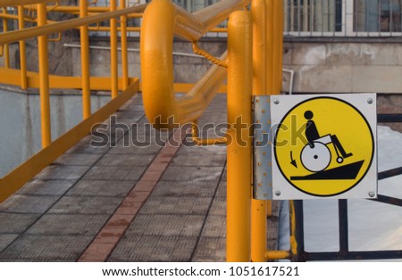 Photo sign for wheelchair users