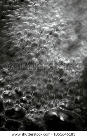 the flow of energy make bubbles in the water flowing
