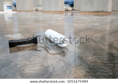 Epoxy flooring painting for water proof on roof slab Royalty-Free Stock Photo #1051675484