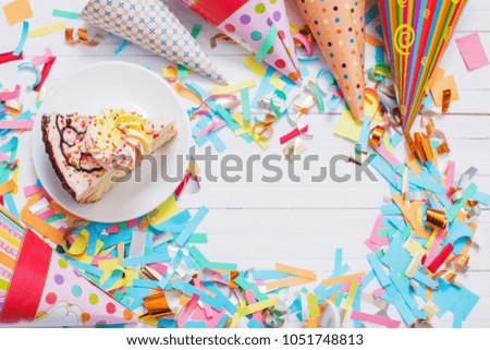 birthday cake and  decoration on white wooden background