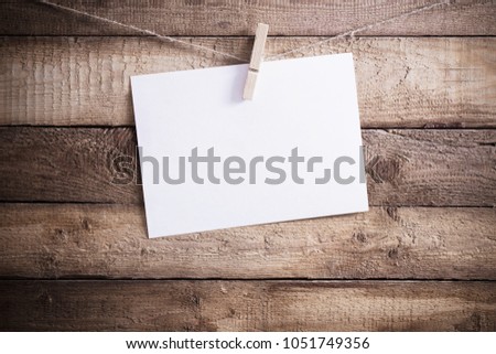 the paper on old wooden background 