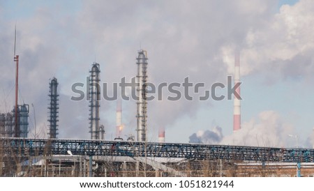 Infrastructure of industrial power plant, tanks and smoking pipes