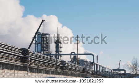 Large power plant with pipes and tanks