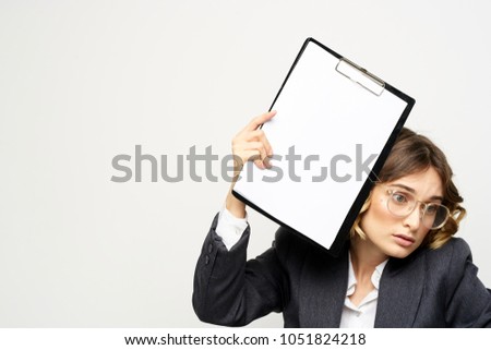 business woman with a folder-tablet, free place                             