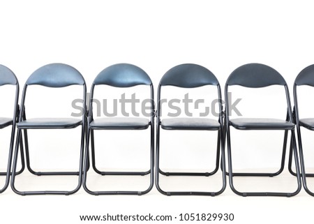 Lined up chairs.