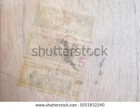 soft photo us dollar with wood backdrop textures background.