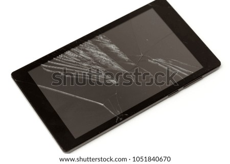 Tablet with a broken screen on a white background