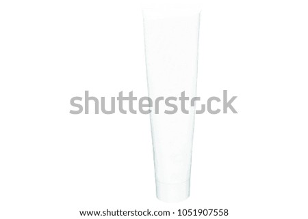 White tube of toothpaste or cream isolated on white background