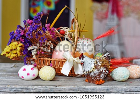 Easter composition with basket, Easter bunny, chicken, eggs, flowers and Easter cake 