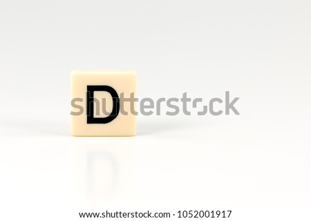 capital letter D on plastic board isolated on white background with copy space
