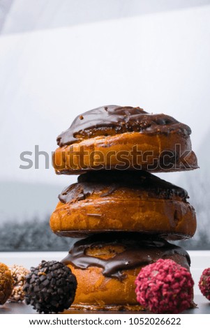 delicious chocolate buns with colored truffles