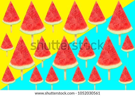   sliced fresh watermelon with ice cream stick pattern and isolated and pastel,yellow background