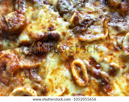 Seafood Pizza, fast food rich of fat, unhealthy eating, traditional food made of flour and cheese