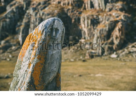 Mengir and Petroglyphs of Altay. Ancient rock paintings in the Altai Mountains, Russia.