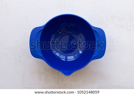 Plastic cups of a multi-colored dish
