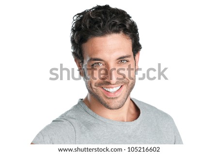 Closeup of happy smiling guy looking at camera isolated on white background
