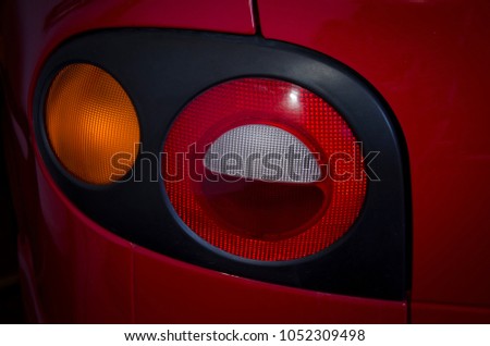 
Close-up of red automobile circular lanterns