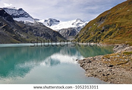 Mooserboden lake with the snowy peaks of Hohe Tauern.