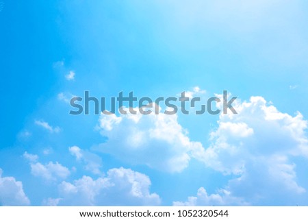 Blurred sky blue or azure sky and cloud on light sun beauty background.