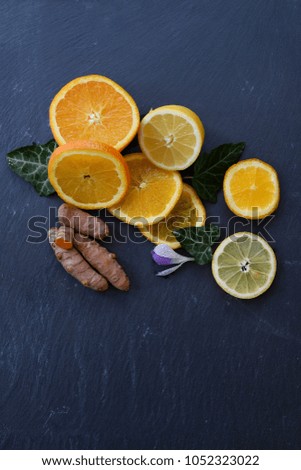 Flat lay of oranges lemons and turmeric roods