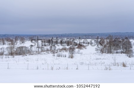 Winter panorama of river valley at early morning. Zhizdra, Kaluzhskaya region, Russia.
