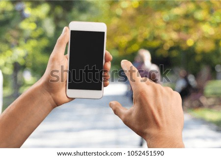 woman hand holding smartphone