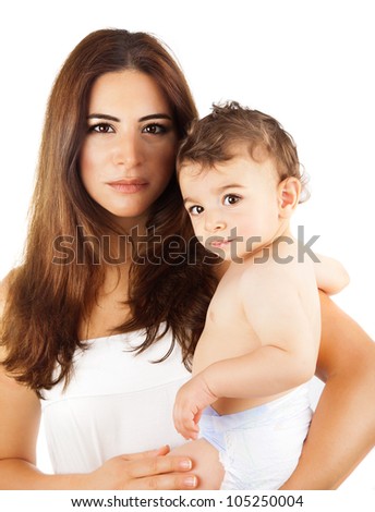 Beautiful mother holding baby boy, mom carry cute child adorable small son, happy family picture, mom and kid indoor isolated on white background, brunette Arabic models, happiness concept