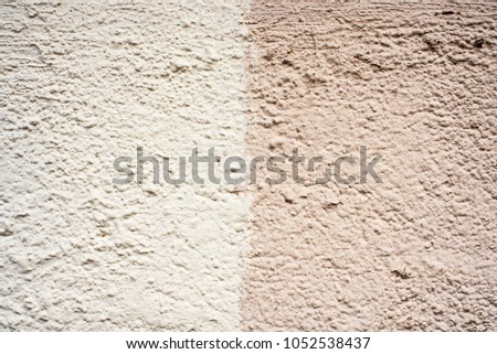Dual paint parget on a wall