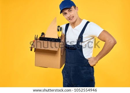happy courier, tools in a box                             