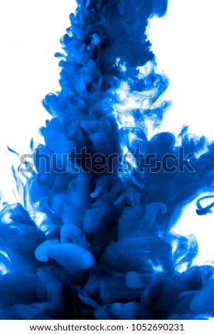blue dye in water on white background
