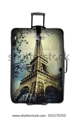 suitcase with eiffel tower photo  isolated over white background