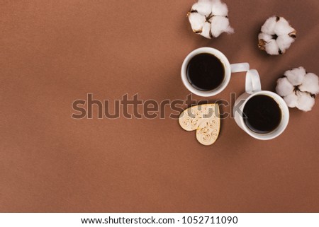 Top view of couple coffee cups on Valentine's day morning.