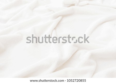 white crumpled blanket, plaid, background with copy space, close up, top view