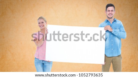 Digital composite of Man and woman holding blank bill board