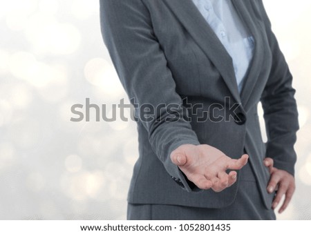 Digital composite of Midsection of businesswoman gesturing