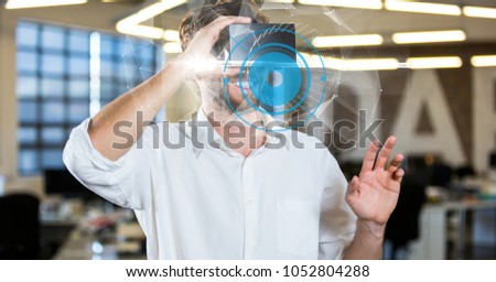 Digital composite of Digital composite image of businessman using VR glasses