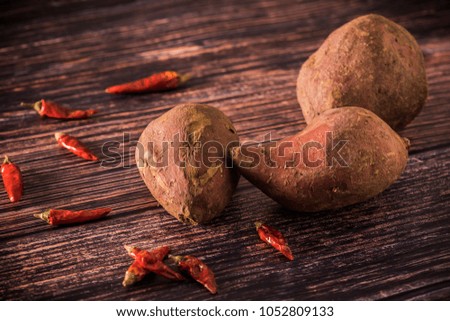 Fresh tempting chinese vegetable red sweet potato sweet melon closeup