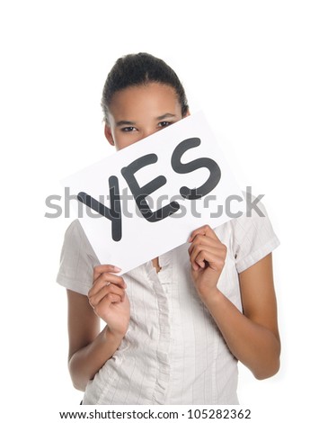 Lovely girl holding yes word board over white background