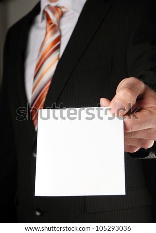 business man showing blank business card or sign