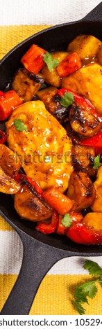Roasted Chicken Breasts with Potatoes, Carrot and Bell Peppers. Selective focus. 