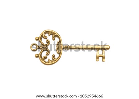 Old Golden key on white