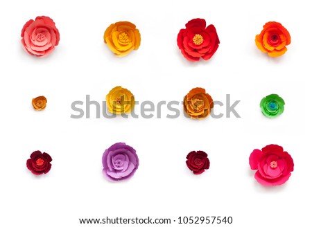 Set of 12 handmade paper flowers (roses) on white isolated background, design element for wedding invitation, red, yellow, green, orange, violet and pink. 