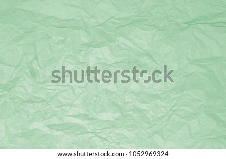 Dirty texture of old crumpled light green paper. Paper textures crumpled backgrounds for design