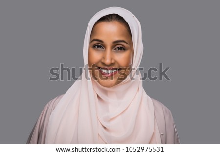 Beautiful middle eastern woman wearing abaya Royalty-Free Stock Photo #1052975531