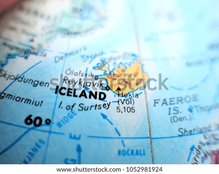 Country of Iceland isolated focus macro shot on globe map for travel blogs, social media, website banners and backgrounds.