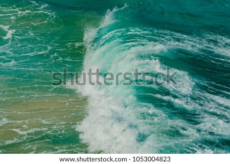 waves on the Atlantic ocean in the rocky coast of the Caribbean sea in the Aruba island of the Netherlands Antilles