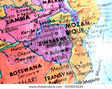 Zimbabwe Africa isolated focus macro shot on globe map for travel blogs, social media, website banners and backgrounds.